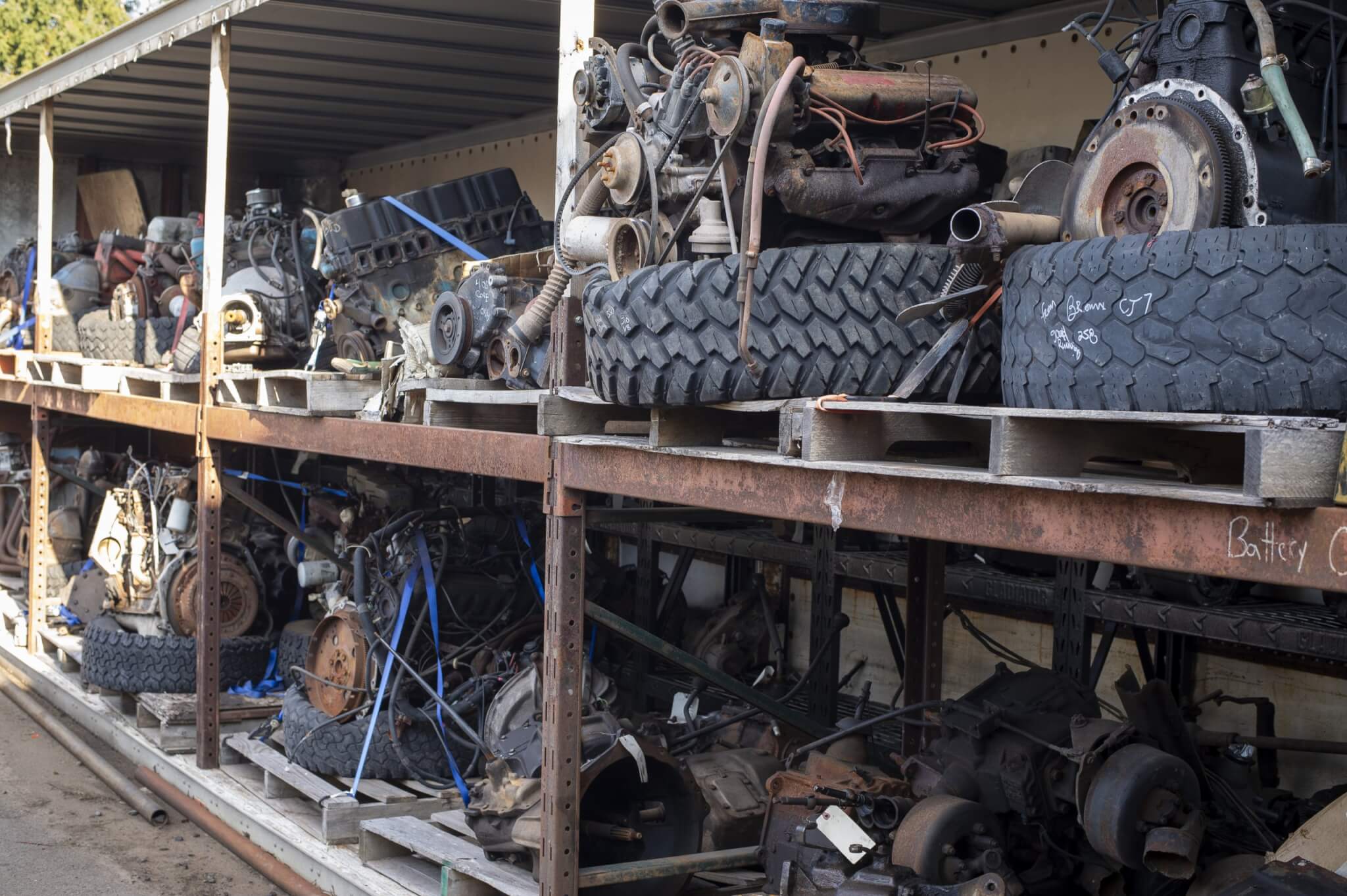 Engines lined up for sale in a salvage yard