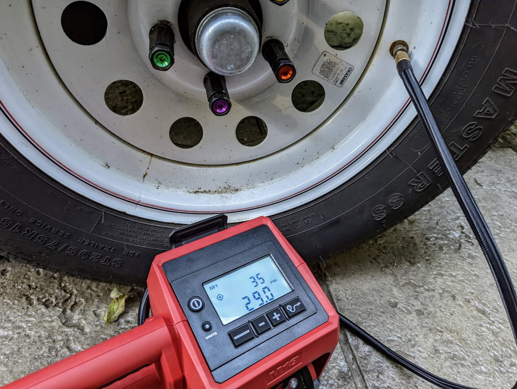 Inflator filling a tire
