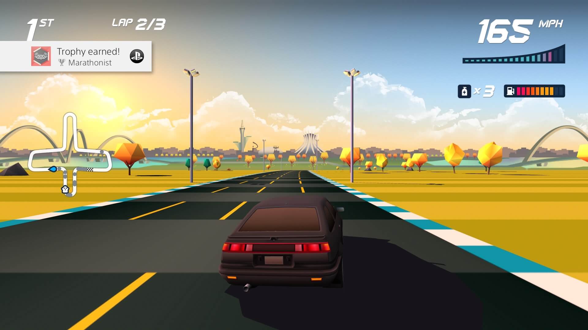 Screenshot of Horizon Chase Turbo game showing A picture containing text, way, road, scene