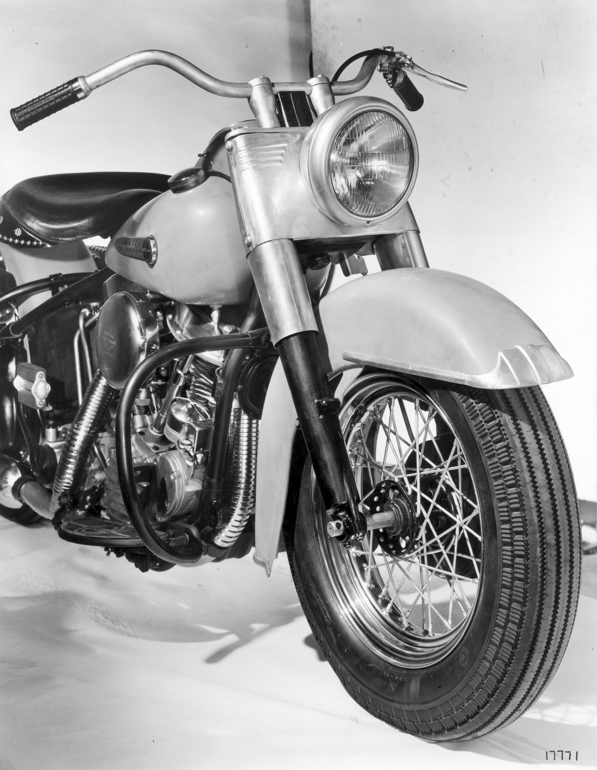 A B&W photo of the front end of a Harley-Davidson 1949 Hydra-Glide.