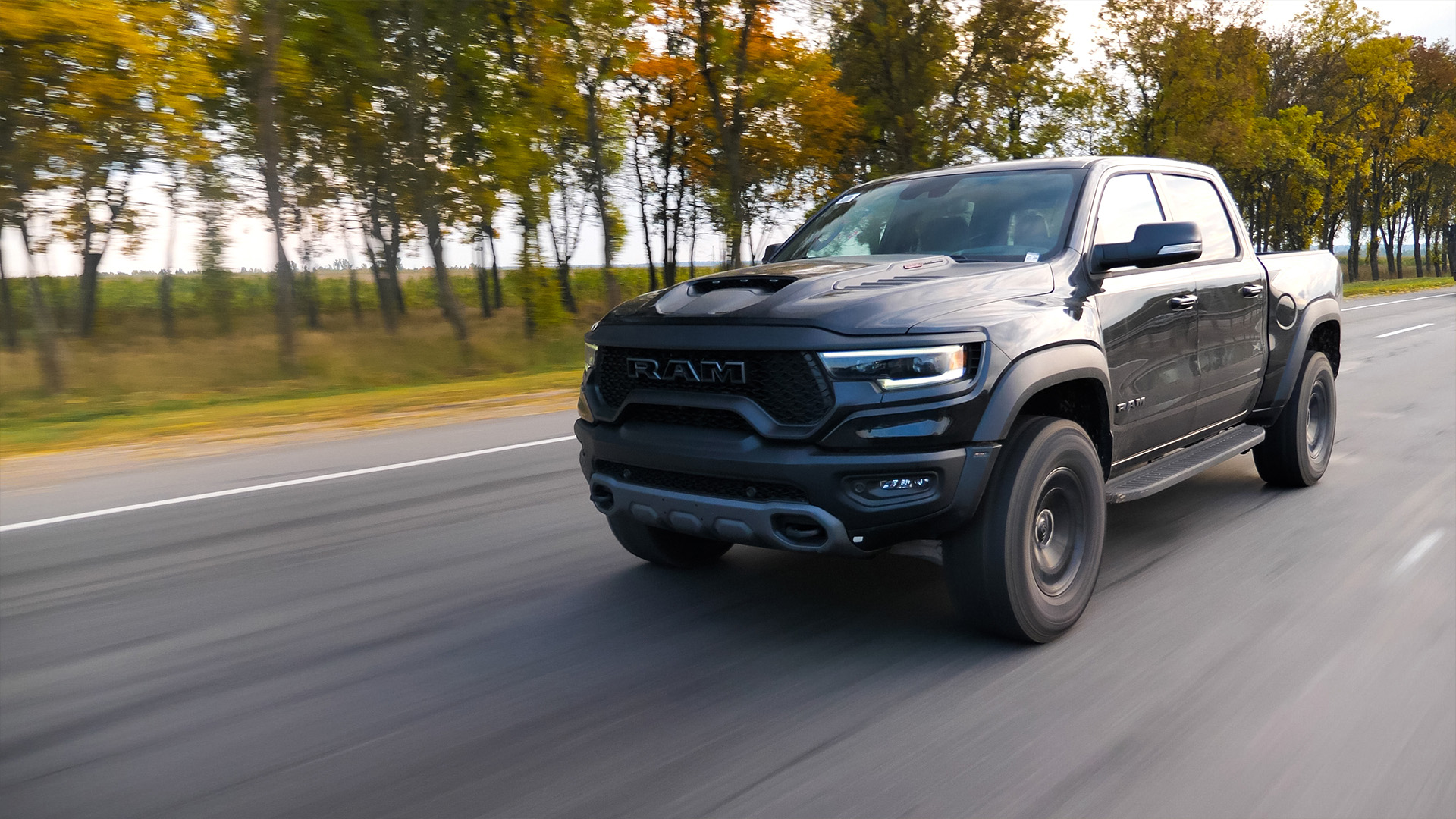 Dodge Ram TRX drives on a country road. Ram TRX is the most powerful series-production pick-up.
