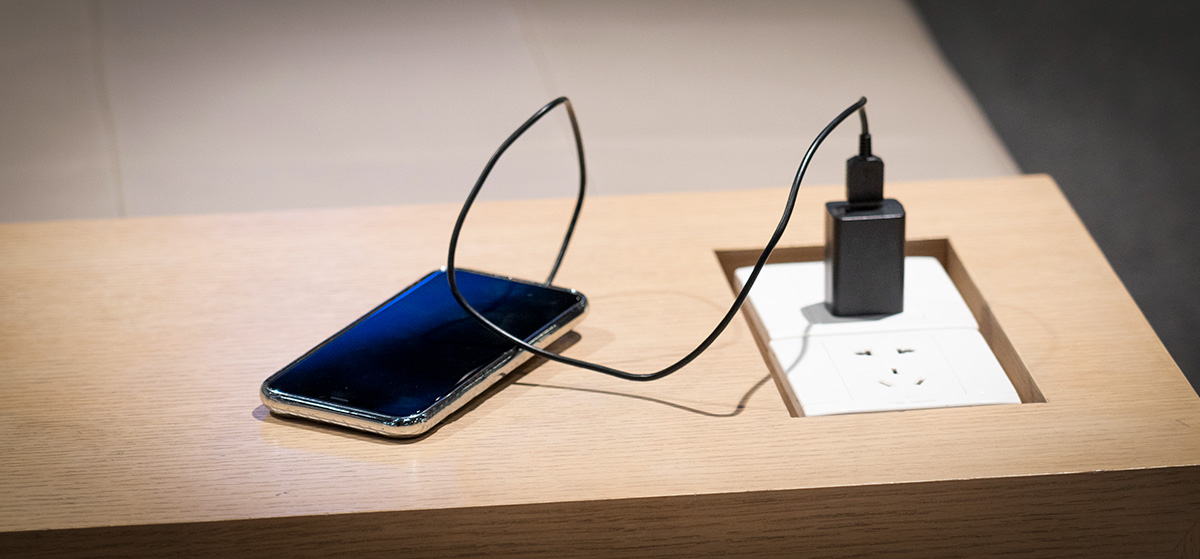 phone charging on table