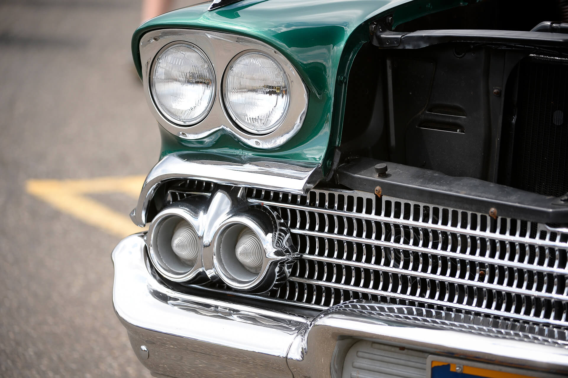 chrome car grill, bumper and headlights