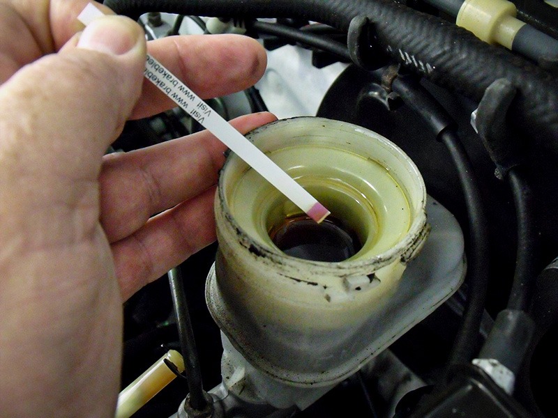 checking brake fluid with test strips